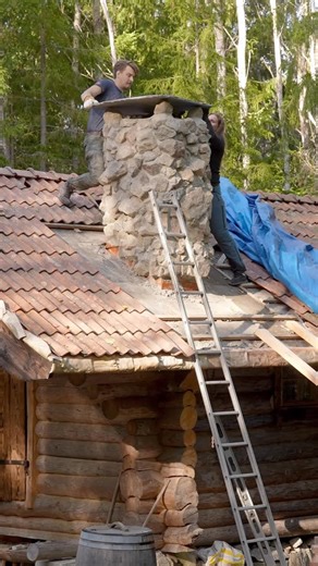 Erik Grankvist on Instagram: "Building a fireplace for my log cabin🔥 From start to finish, a quick compilation of how I built the fireplace for my log cabin. Watch the full process on my YouTube channel. Thank you @nilsogren for forging the hook for cooking over the fire! Its holding up great! #naturisourplayground #logcabin #sweden"