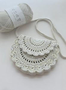 889K views · 10K reactions | Learn how to crochet this lightweight raffia phone bag with pretty open-work motifs. The tutorial covers the whole process—bag body, flap, sides, and strap—great for beginners and beyond. Stylish, practical, and perfect for your daily essentials. Watch the full tutorial and start making yours today! ✨ | Jonalyn B. Mangunay | Facebook