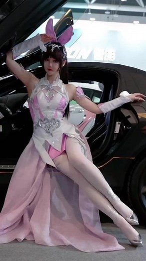 Cosplay Showcase: Elegant Bunny Outfit at Car Exhibition