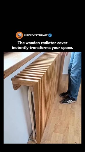 Explore l Learn l Facts on Instagram: "a wooden radiator cover does more than just hide an old or bulky heater — it completely changes how a room feels. with smooth slats, clean lines, and a natural wood finish, it turns a plain radiator into a stylish piece of furniture. the warmth still flows through, but now it looks like a design element instead of a machine. it adds texture, elegance, and a modern touch to the space, making the room feel cozy, organized, and visually pleasing. one simple up