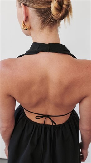 DISSH on Instagram: "Meet the Tammy. Made from 100% cotton, with a plunging v-neckline, halter neck and flared peplum design. ⁠ ⁠ Available online now in white and black cotton poplin.⁠ ⁠#DISSH"