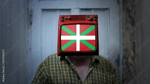 Television Man with the Basque Flag on the Screen. Zoom In.