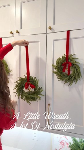 Comment WREATH for links to be sent to your DMs. These sold out on Amazon, but found more! Get them while you can! The easiest mini Christmas cabinet wreaths to hang. All you need is the wreath and mini command hooks. I also used them on my barstools and dining chairs. Love the bells ringing everytime you open and close the cabinets. So festive and just like Grandmas Christmas Kitchen. #christmaswreath #christmasdecor #christmasdecorations #walmart #walmarthome #walmartcreator #walmartfinds #hol