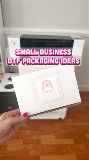 DTF printing beyond t-shirts 👀🔥 can also be used to elevate your small business packaging. Using my xTool Apparel Printer to create custom branded corrugated shipping boxes for my small business packaging. This all-in-one DTF system prints, cuts the transfer film, automatically sends it through the powder shaker, removes excess adhesive powder, and cures it …no manual handling between steps. Even better? The software calculates my exact ink and film cost before I press print. Real production c