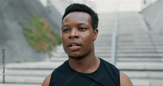 Running, fitness and tired black man with city steps challenge, workout or intense cardio training. Stop, breathe or African male runner with sports, fatigue or pause after stairs, run or performance