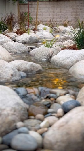 Building waterfalls one boulder at a time #aquascape