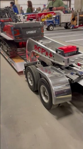 Look at this custom built Peterbilt RC truck with a low boy trailer and excavator