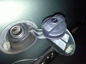 How to open the fuel cap in the Volkswagen Passat?