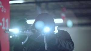 Special assault team targeting scopes on modern rifles with flashlights Free Stock Video Footage