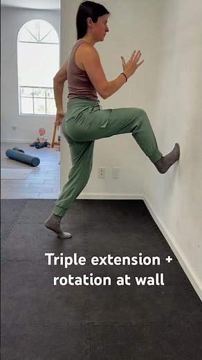 Standing triple extension with thoracic rotation at the wall