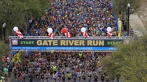 Runners conquer the Green Monster en route the Gate River Run finish line