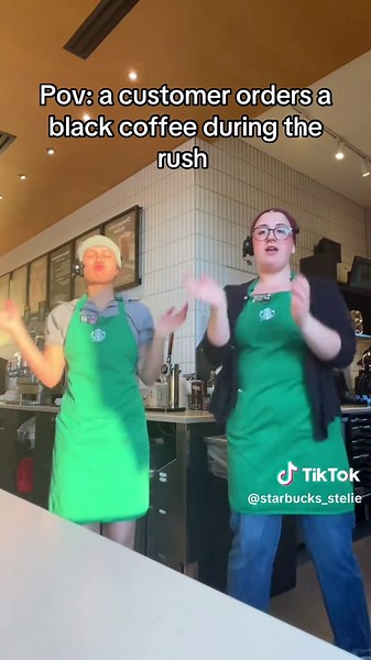 Customer Orders Black Coffee During Rush at Starbucks