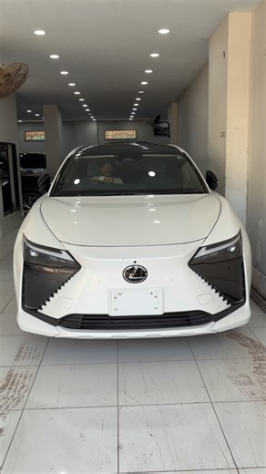 Lexus RZ 450e: Luxury Electric SUV The Lexus RZ 450e is a premium electric vehicle featuring dual-motor All-Wheel Drive, a 71.4 kWh battery, and approximately 308 horsepower. Its range is estimated to be around 200-220 miles. Key features include a 14-inch touchscreen, Mark Levinson audio, and advanced safety features. Specifications: Motors: Dual Permanent Magnet Synchronous Motors Drivetrain: All-Wheel Drive Horsepower: Approximately 308 hp Acceleration (0-60 mph): Around 5.0 seconds Battery C