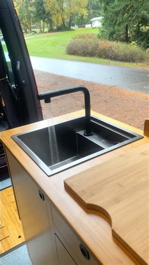 Super cool modular sink for camper vans that doubles as counter space 😮 #sprintervanconversion