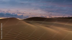 Timelapse of sunset over the sand dunes in the desert. Death Valley