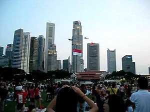 Helicopters carrying Singapore's national flag NDP 2009