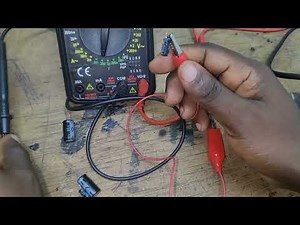 How to test CAPACITORS Using a Multimeter.