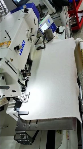 Automatic buttonhole machine