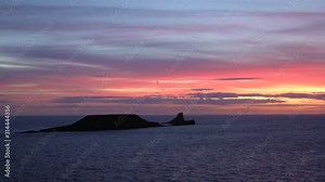 United Kingdom, South Wales, Gower peninsular, sunset over Worms Head
