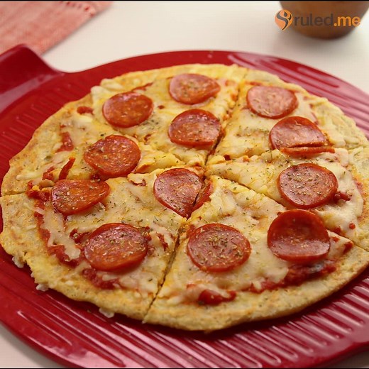 12K views · 60 reactions | This keto pepperoni pizza crust is naturally crisp and crunchy, it holds together like a regular slice of pizza, and it actually tastes like the real deal. Full Recipe: https://www.ruled.me/low-carb-pepperoni-pizza/ Want to find this video again? Save to your watch later list. :) https://youtu.be/G51qy7BRH8c | Ruled.Me | Facebook