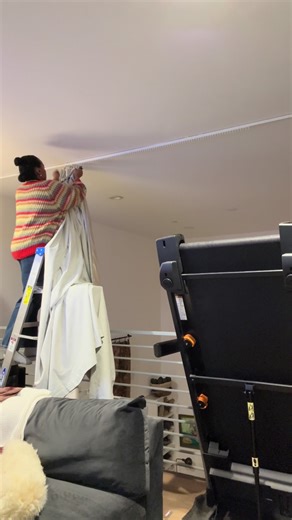 I'm giving my living room a much-needed refresh by upgrading the window treatments! I'm excited to install new blackout curtains from @Joydeco_marketing , which are perfect for creating a cozy, dark ambiance night or day. Watch as I show you how to hang curtains to perfectly kiss the ground, making a significant difference in my home decor and providing excellent room darkening curtains for a better viewing experience. Discount code: Corbin15 Store discount link: https://dada.link/z89FHj style: 