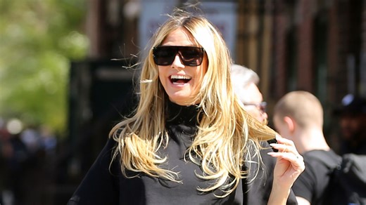 Heidi Klum shows off long legs in tiny leather miniskirt in NY