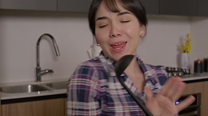 Woman Singing Her Heart Out in the Kitchen - Free Stock Video