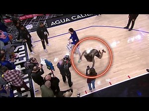 Clippers Reporter Kristina Pink slips and falls during postgame interview