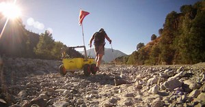 Armadillo EVS man trailer hauls gear over land, snow, water and air