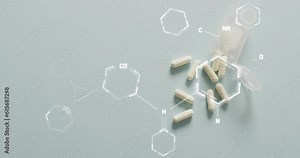 Animation of dna strand diagrams over pills