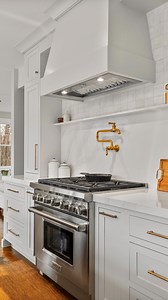 1.5K views · 758 reactions | Kitchen features to consider for your home that made our list of “ins” Keeping it mainly neutral with earthy woody tones, stone backsplash, and bringing in pops of color in the kitchen cabinets. Custom features and built-ins are always on our list too, because adding a touch of your personality is the key to a cozy space. #kitchendesignlayout #kitchenfeatures #kitchenmusthaves #kitchendesignideas | Kadilak Homes | Facebook