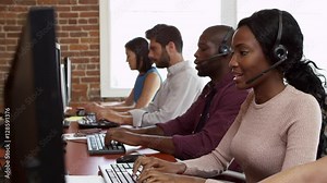 Staff At Desks In Customer Service Department Shot On R3D