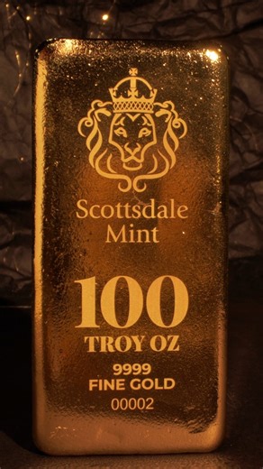 Heavy in hand, rich in history — the 100 oz gold bar is as iconic as it gets. | Scottsdale Mint