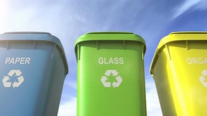 Multi Colored Garbage Bins with Waste Type Separation Labels and Recycle Logos