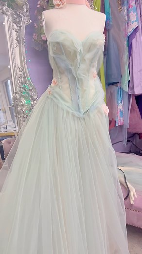 Today’s featured treasure is the Lily Monet Gown, a romantic blend of silk, tulle, and hand-beaded details inspired by soft petals and watercolor light by Claude Monet . 🌸🎨 https://www.ebay.com/itm/127517234603? This gown includes: • A structured corset bodice • Flowing silk tulle sleeves • Hand-sewn faux floral accents • A matching silk rose choker • Size Medium / Large In excellent condition, with a touch of fraying on the silk and a few loose flowers — gentle signs of her time in the studio