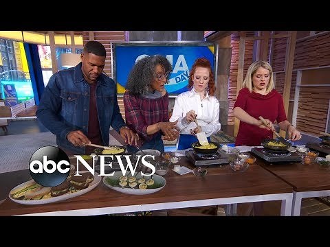 Carla Hall shows Michael, Sara and Jess Glynne how to make the perfect omelet