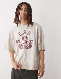 Champion graphic t-shirt in beige  | ASOS