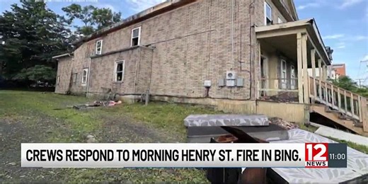 Crews encounter heavy black smoke at structure fire