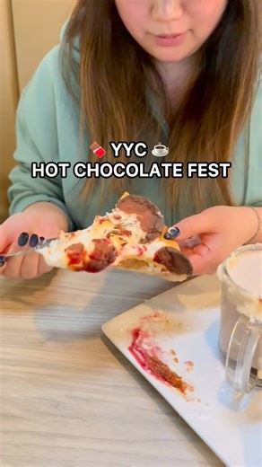 🍫☕️ YYC Hot Chocolate Fest 2026 @topspizzasouth is offering Peanut Butter & Jam Fluff Nutter PLUS which is served with a layer of creamy, rich house made peanut butter whipped cream, a drizzle of tangy raspberry reduction and chopped Reese’s Peanut Butter Cups. You can enjoy it with what might be the most addictive dessert pizza! The dessert pizza is layered with peanut butter, raspberry jam and toasted marshmallow. I can confirm it’s dangerous delicious! ⭐️ YYC Hot Chocolate Fest runs from Feb