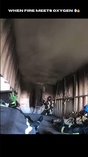 #firefighters train in a flashover chamber. Watch the intense moment when fire blows through a door!