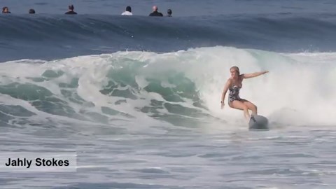 Female surfers take on perfect glassy waves at Keramas, Bali