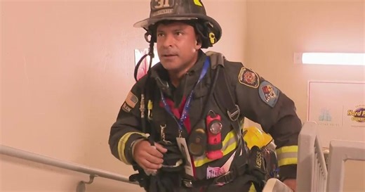 Hundreds climb Hard Rock Hotel steps in solemn 9/11 tribute