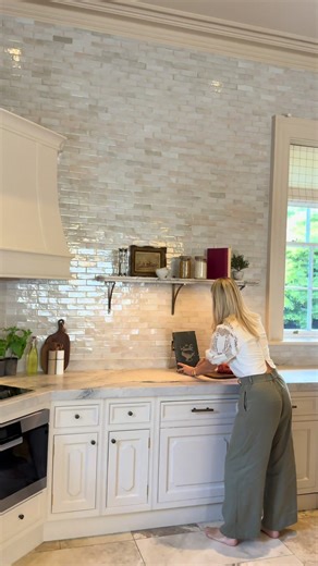 Nothing beats the finishing touches. This kitchen was already working well, so we refined, updated, and elevated it . The changes we included were a brass inlaid new marble top , repaint and tile. We also replaced the cooker hood and added tall glazed cabinetry. That made all the difference and brings the space into a fresh, modern chapter. #irishinteriors #kitchen #kitchenrenovation #kitchenmakeover #interiordesign