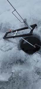 Little surprise when the tip up flag is up! #icefishing #fishing | Stromquist Outdoors