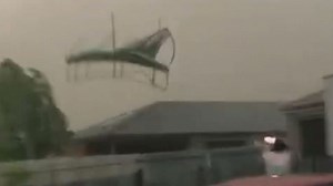 Trampoline flies through the air as storm sweeps through town