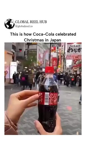 GLOBAL REEL HUB on Instagram: "The post shares a 15-second video from Coca-Cola's 2016 "Ribbon Bottle" campaign in Japan, showing people pulling labels off bottles to reveal festive red ribbon bows, blending product utility with holiday cheer. Posted on December 10, 2025, by —a music and dance enthusiast account—it amassed 235,000 views and 9,650 likes, highlighting the timeless viral potential of creative, interactive marketing. Thread replies express delight and nostalgia, with users praising 