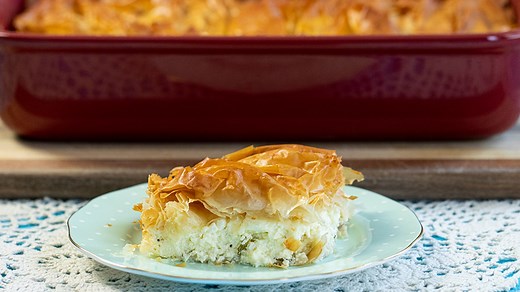 Tiropita: Greek Feta & Phyllo Pie This classic greek pie is filled with feta and other cheeses then wrapped in buttery phyllo and baked to a crisp perfection. Tiropita is sold throughout Greece in coffee shops and bakeries. It pairs well with a hot cup of coffee but you can also serve it as a main course with a nice salad. Delicious! Printable Recipe: https://www.dimitrasdishes.com/tiropita-greek-feta-phyllo-pie/ | Dimitra's Dishes