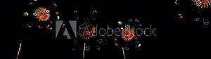 fireworks show. 4K New year's eve fireworks celebration loop seamless of real fireworks background. abstract Multicolor golden shining glowing fireworks show with bokeh lights in the night sky.