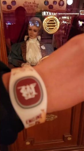 Magicband+ Main Street cinema scanning button with light package Disneyland park California 2/7/2026