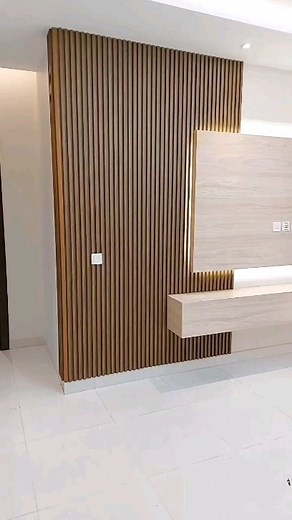 6.1K views · 206 reactions | The Colima Floating TV Stand and wall panels From BACH epitomizes contemporary living with its streamlined, minimalist design that not only conserves space but also introduces an element of modern aesthetic into your living room. This modern media console is engineered to support large flat screens up to 80 inches, making it a versatile option for almost any TV size, ensuring your entertainment setup is both stylish and functional. | BACH Furniture | Facebook